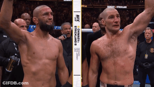 Two Men Standing Next To Each Other With UFC GIF