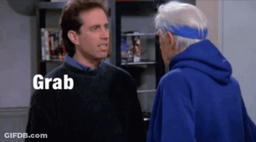 Two Men Standing Next To Each Other GIF