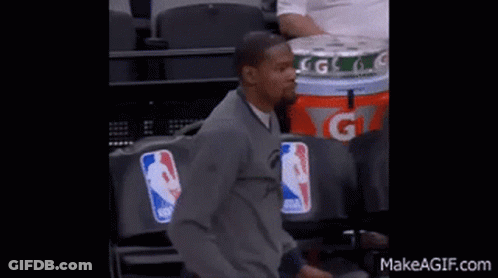 Two Men Standing Next To Gatorade GIF