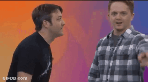 Two Men Standing Next To Japan GIF
