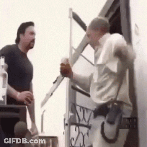 Two Men Standing Next To White Truck GIF