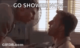 Two Men Standing Next To Window GIF