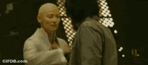 Two Men Standing On Balcony GIF