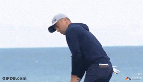 Two Men Standing On Golf Course GIF