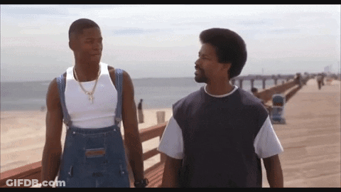 Two Men Standing On Pier Talking GIF