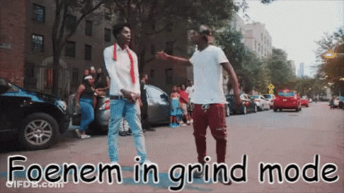 Two Men Standing On Street Saying Foenem In Grind Mode GIF
