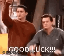 Two Men Standing One Giving Thumbs Up GIF