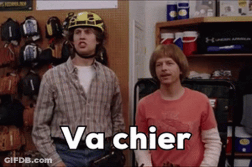 Two Men Standing One In Helmet Saying Va Chier GIF