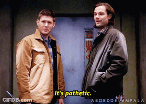 Two Men Standing One Saying It's Pathetic GIF