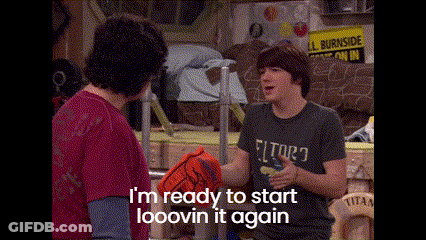Two Men Standing One Says I'm Ready To Start Looovin It Again GIF