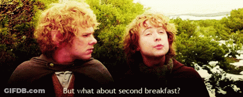Two Men Standing Saying But What About Second Breakfast GIF