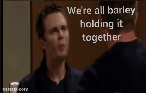 Two Men Standing Saying We're All Barley Holding It Together GIF