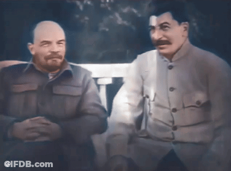 Two Men Standing Side By Side GIF