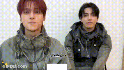 Two Men Standing Together GIF