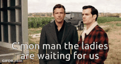 Two Men Standing With C'mon Man The Ladies Are Waiting For Us GIF