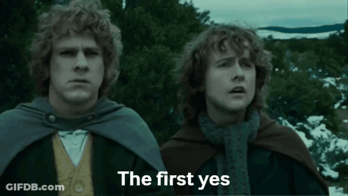 Two Men Standing With First Yes GIF
