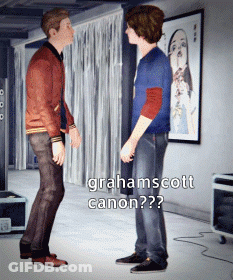 Two Men Standing With Grahamscott Canon GIF