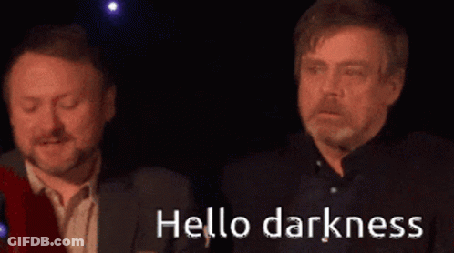 Two Men Standing With Hello Darkness GIF