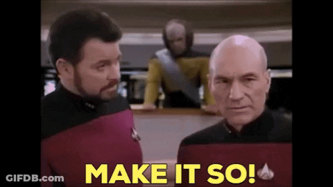 Two Men Standing With Make It So GIF