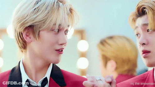 Two Men Standing With MJ The Snowman GIF