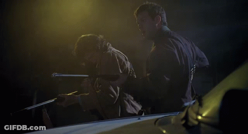 Two Men Standing With We Got It Behind Them GIF