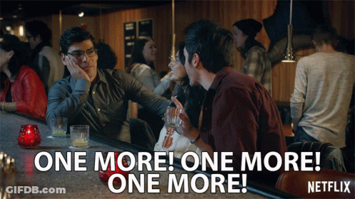 Two Men Talking At Bar GIF
