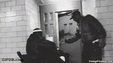 Two Men Talking At Door GIF