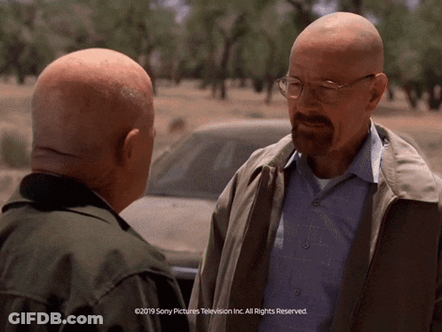 Two Men Talking In Front Of Car Sony Pictures Television GIF