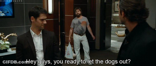Two Men Talking In Hallway GIF