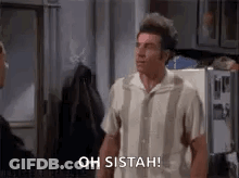 Two Men Talking In Kitchen GIF