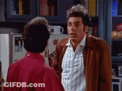 Two Men Talking In Kitchen GIF