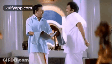 Two Men Talking In Living Room GIF