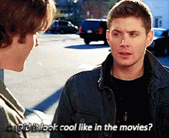 Two Men Talking In Parking Lot Asking If It Looked Cool Like In Movies GIF