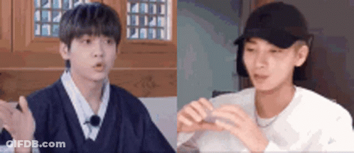 Two Men Talking In Room GIF