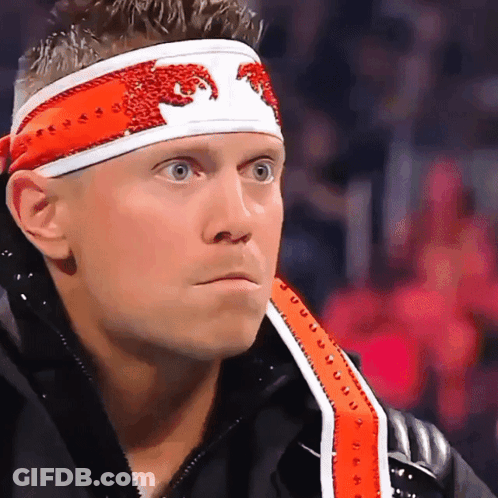 Two Men Talking In Wrestling Ring GIF
