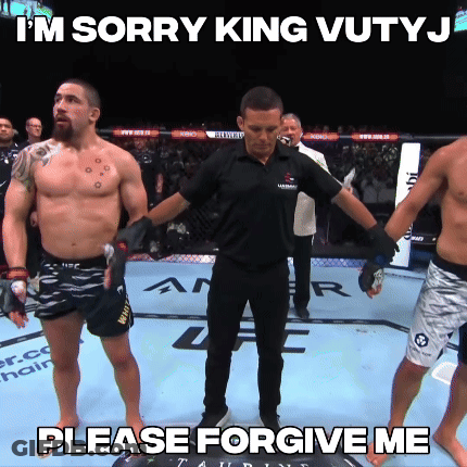 Two Men Talking Next To Fight Week Sign GIF