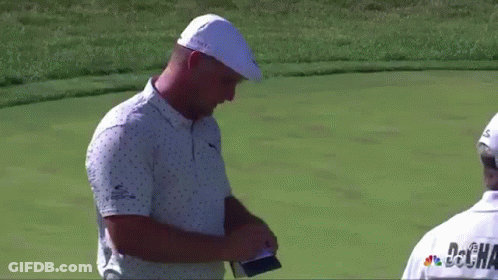 Two Men Talking On Golf Course GIF