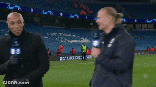 Two Men Talking On Soccer Field Saying Recalice Fuse GIF