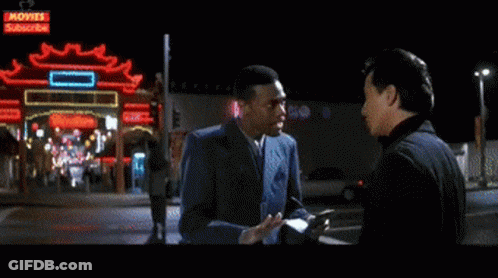 Two Men Talking On Street Movies Subscribe Sign GIF