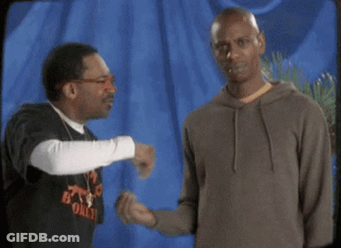 Two Men Talking, One In B Only Shirt GIF