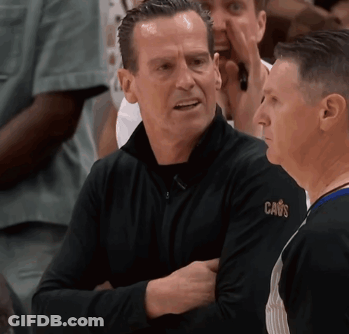 Two Men Talking One In Black Cavs Shirt GIF