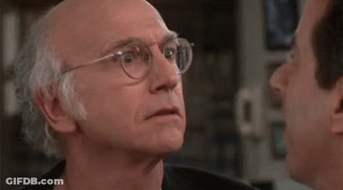 Two Men Talking One In Pink Shirt GIF