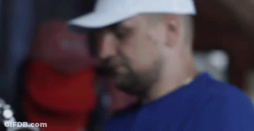 Two Men Talking One Smoking GIF