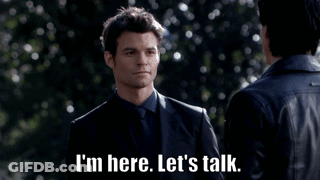 Two Men Talking GIF