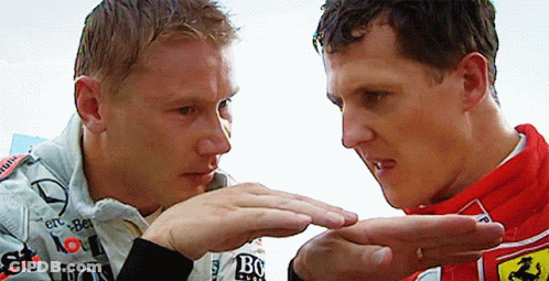 Two Men Touching Hands Ferrari Logo Sleeve GIF