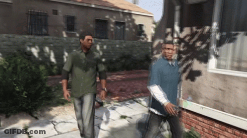Two Men Walking Down Sidewalk GIF