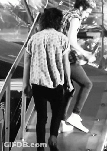 Two Men Walking Down Stairs Black And White GIF
