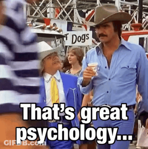 Two Men Walking Past Dogs Sign GIF