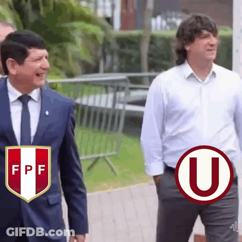 Two Men Walking: Suit And White Shirt With U GIF