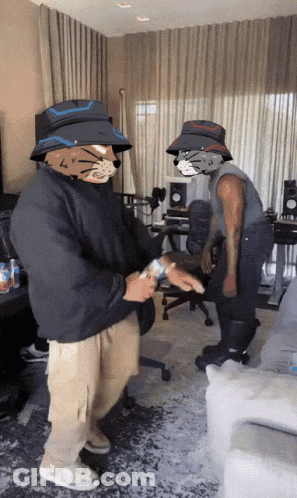 Two Men Wearing Cat Masks GIF